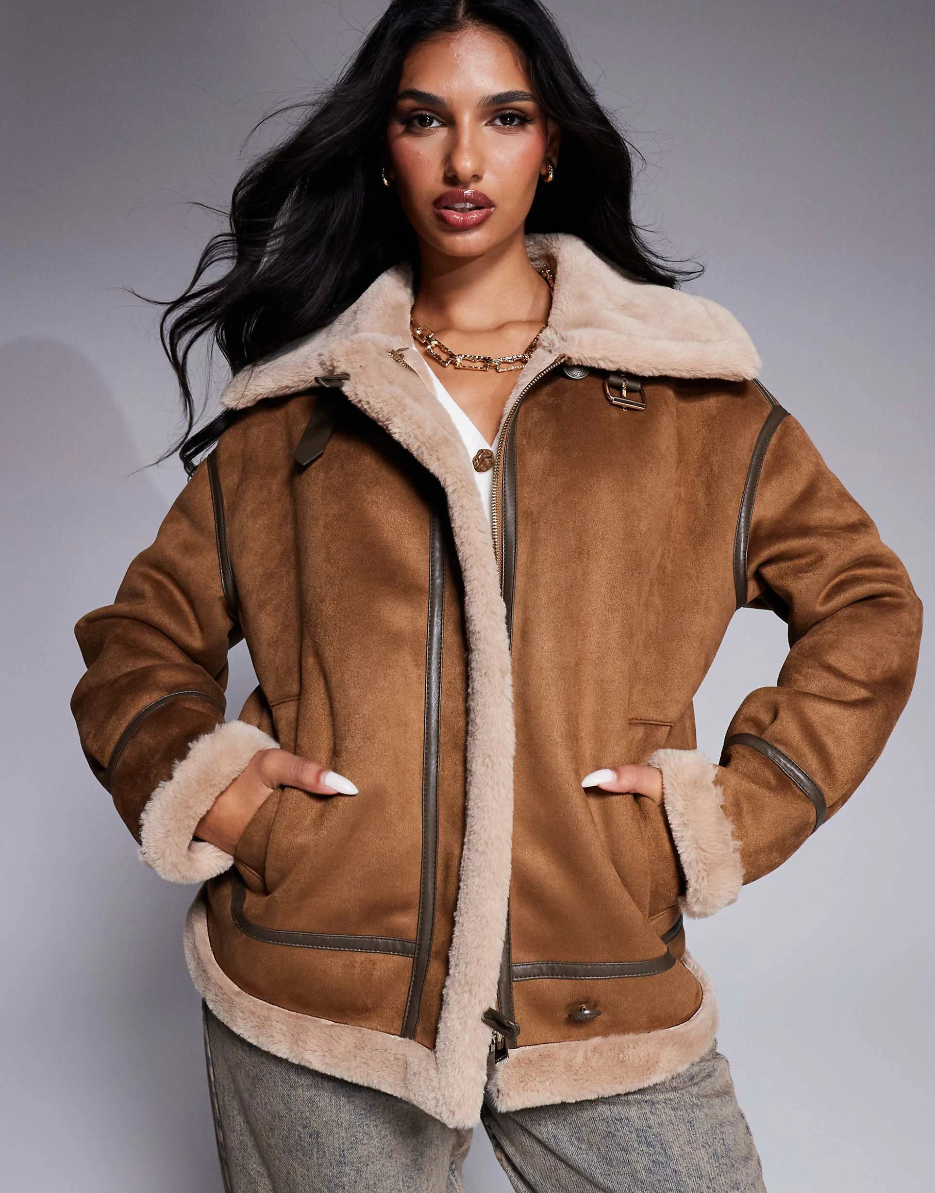 Model wearing Womens Chestnut Suede Beige Shearling Oversized Aviator Jacket