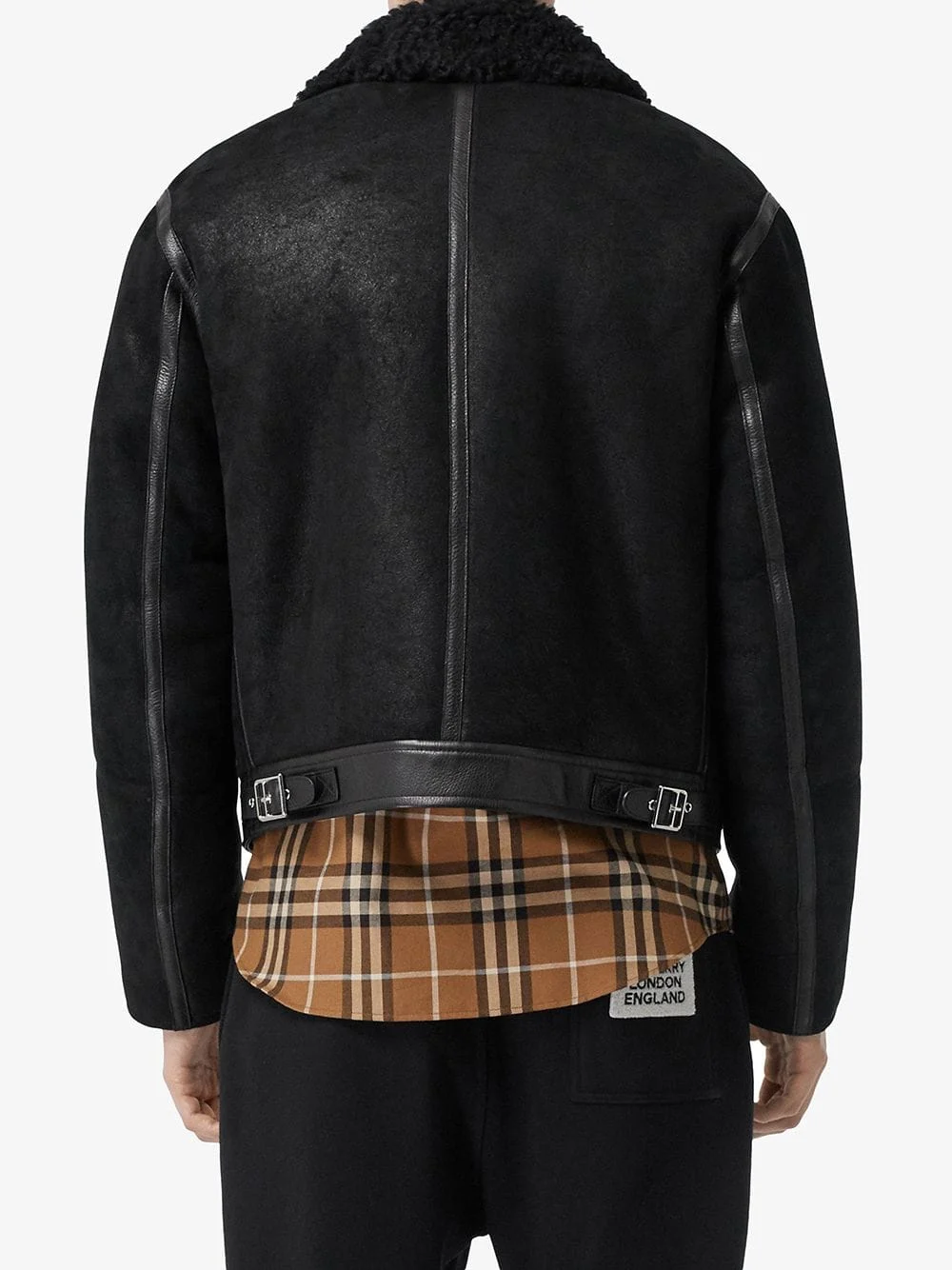 Back view of Women Black Quilted Leather Jacket Gold Hardware with diamond quilted yoke
