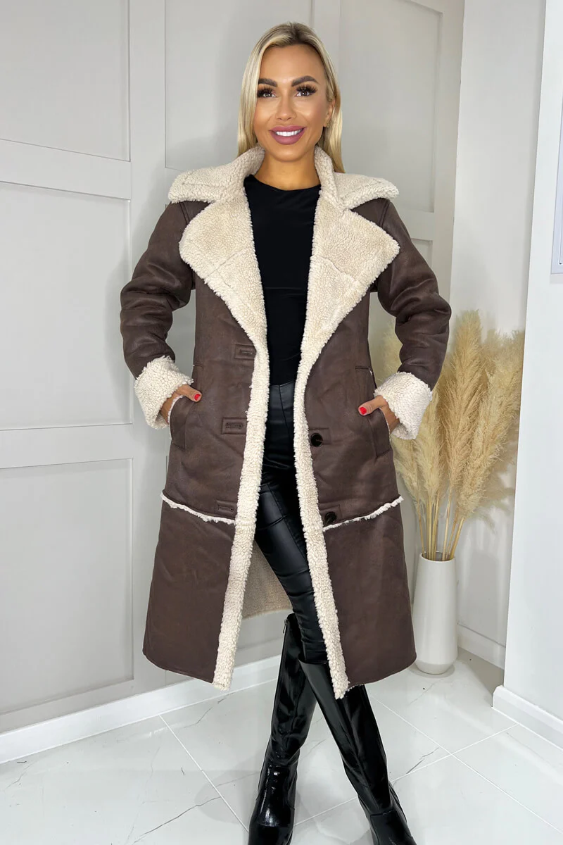 Model wearing Womens Dark Brown Suede Off White Shearling Long Trench Coat
