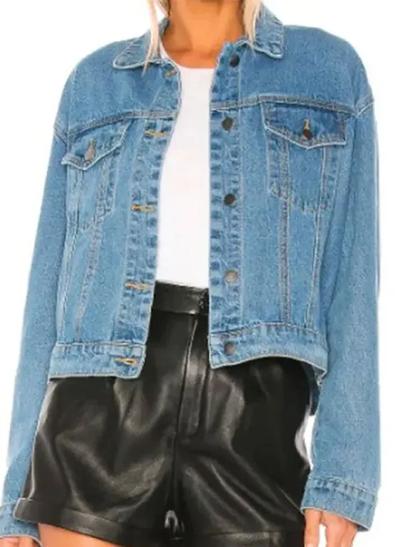 Front view of the light blue denim jacket featuring a button placket, chest flap pockets, and classic collar. People We Meet On Vacation Poppy Denim Jacket