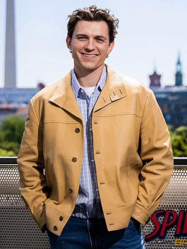 Front view of the beige leather jacket featuring a button-up front, shirt-style collar, and waist pockets worn over a plaid shirt. Spider-Man Brand New Day Tom Holland Beige Leather Jacket