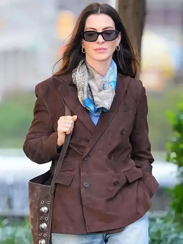 Front view of Anne Hathaway wearing the brown suede blazer as Andy Sachs Brown Suede Blazer