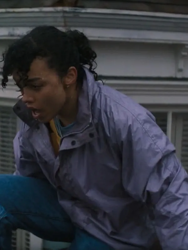 Front view of Whitney Peak wearing the purple parachute jacket in the movie ThrashWhitney Peak Purple Jacket