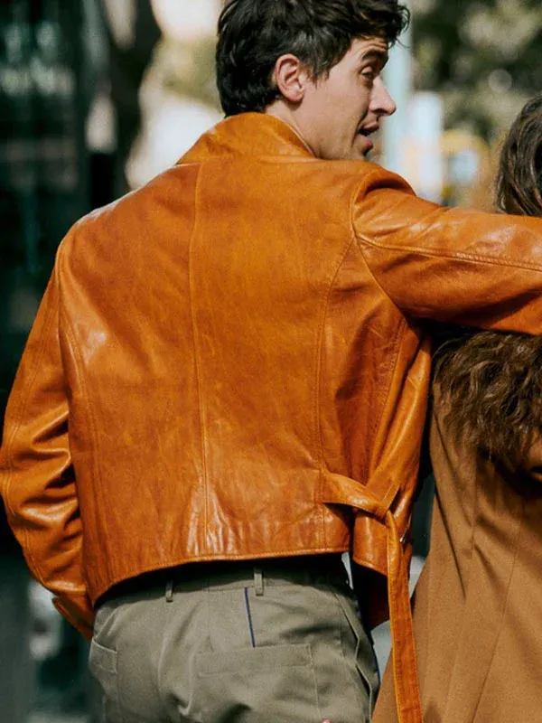 Back view of Tom Blyth as Alex wearing the mustard leather jacket in People We Meet On Vacation