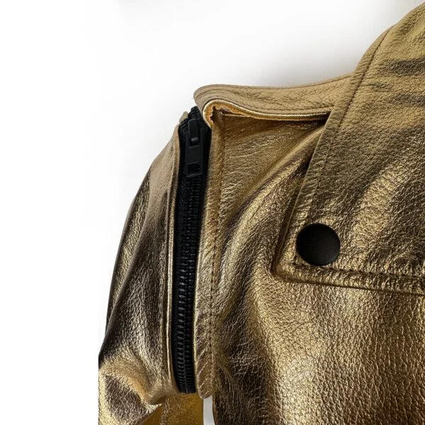 Women Metallic Gold Removable Sleeve Leather Jacket side view showing asymmetrical zipper and lapels