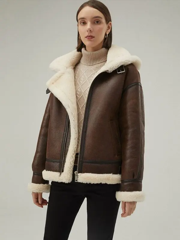 Model wearing Womens Dark Brown Leather Off White Shearling Hooded Aviator Jacket