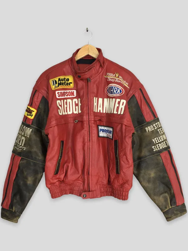 Front view of the red biker leather jacket featuring racing sponsor patches, front zipper closure, snap-tab collar, and weathered sleeves. Your Fault London Ben Mangham Red Biker Leather Jacket