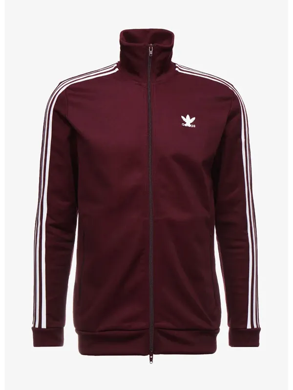Front view of the maroon track jacket featuring a full-length zipper, stand-up collar, white sleeve stripes, and chest logo. Your Fault London Kerim Hassan Maroon Track Jacket