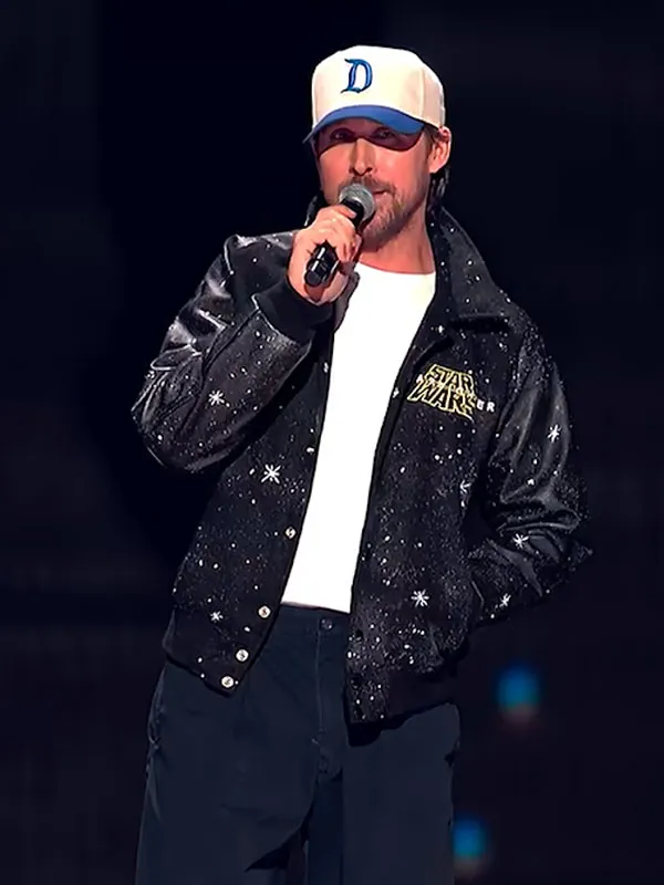 Ryan Gosling wearing Star Wars Starfighter Galaxy Splatter Varsity Jacket front view. Star Wars Starfighter Ryan Gosling Galaxy Splatter Varsity Jacket