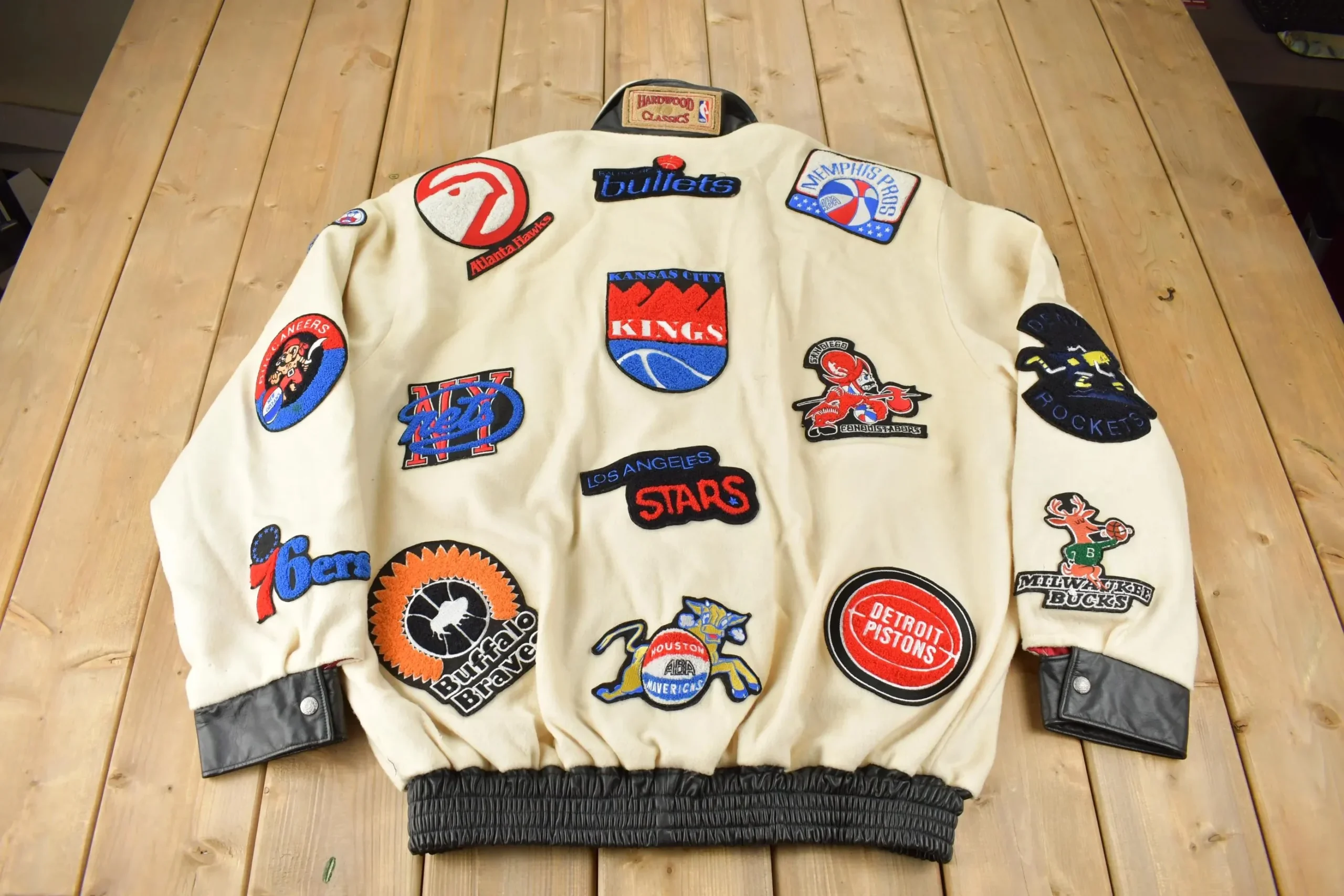 Back view of vintage Jeff Hamilton ABA jacket showing embroidered logos