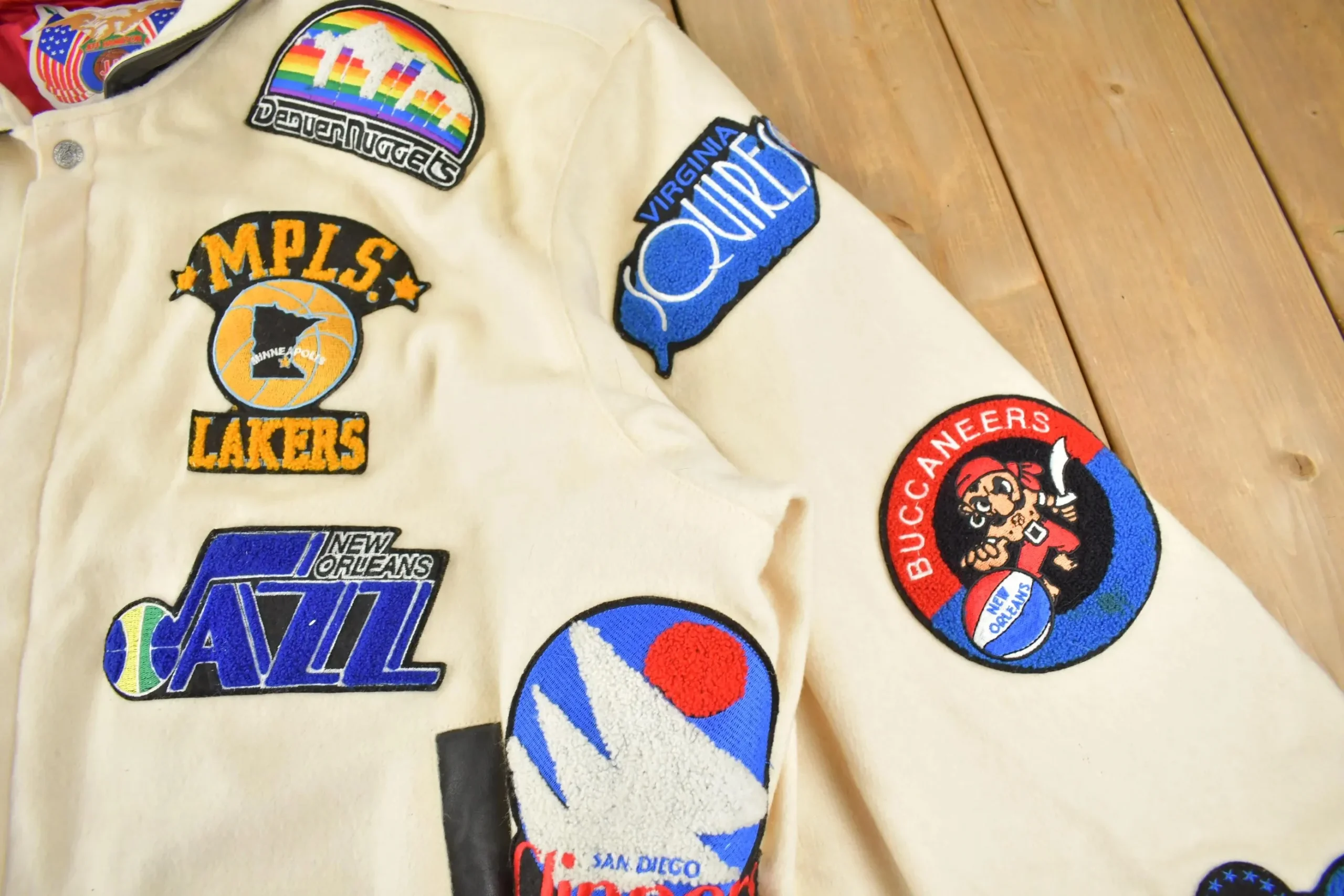 Close up of Oakland Oaks patch and leather pocket trim on vintage Jeff Hamilton ABA jacket