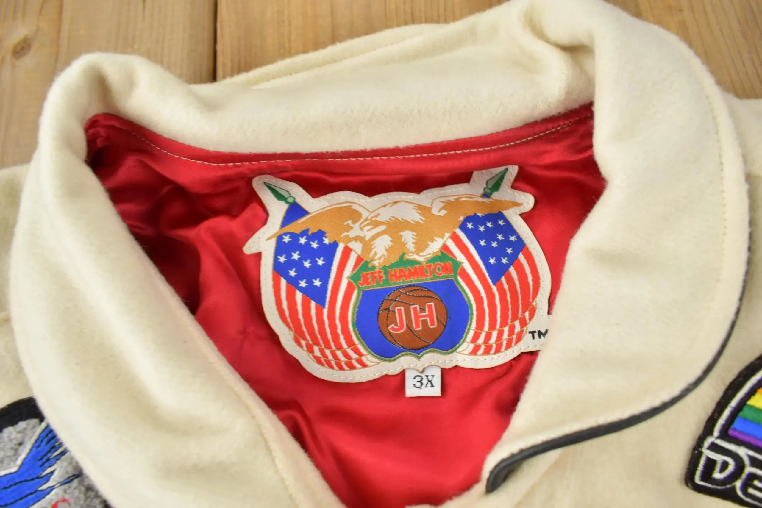 Close up of Oakland Oaks patch and leather pocket trim on vintage Jeff Hamilton ABA jacket