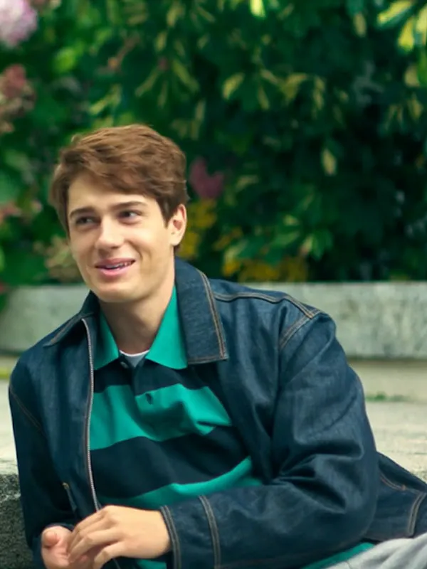 Male model leaning outdoors in Boulevard Ainara Biel Anton Denim Jacket over striped polo