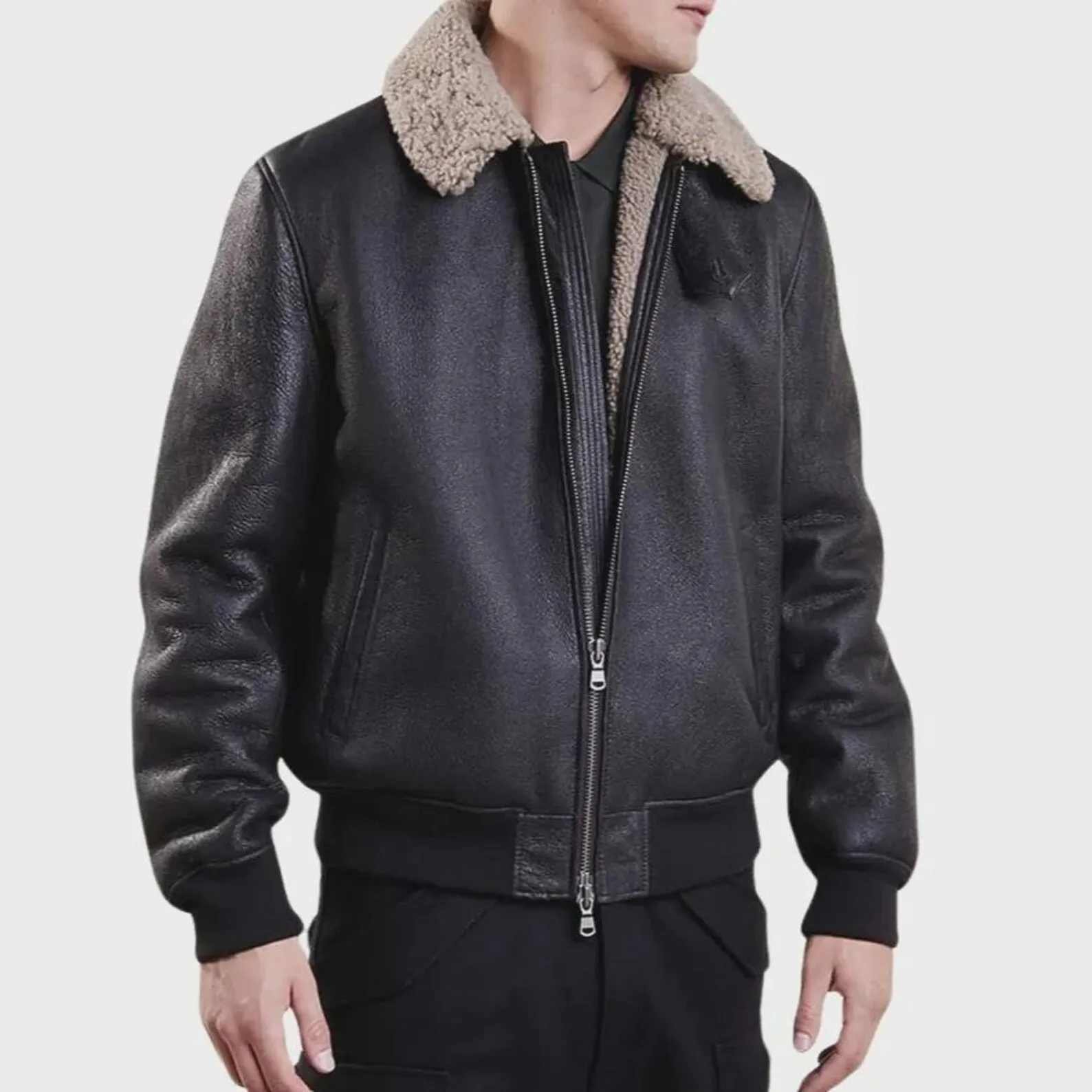 Men's black leather bomber jacket with shearling collar, front open view