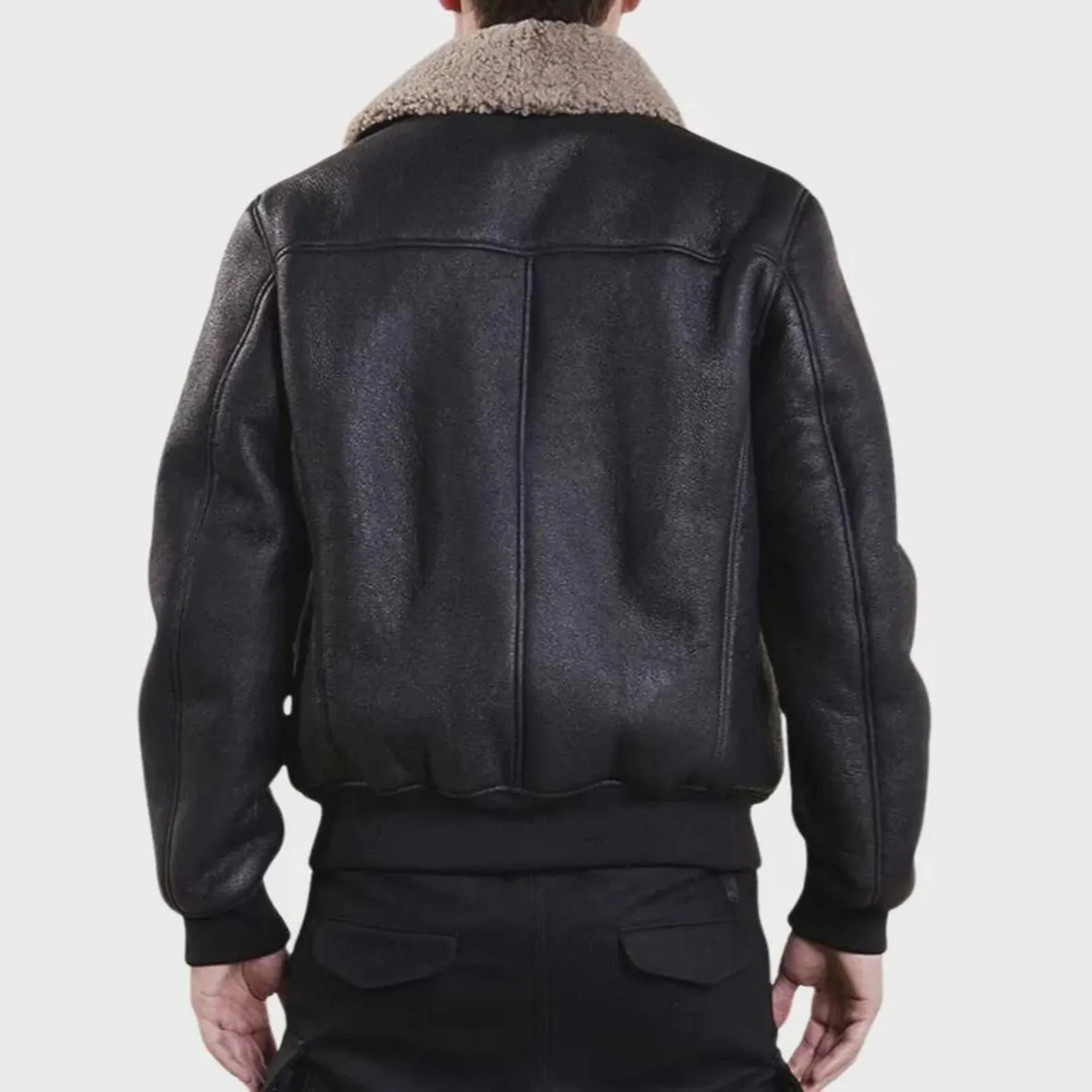 Men's black leather bomber jacket with shearling collar, front open view